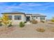 Modern house exterior with gray roof and landscaping at 3588 W New Life Ln, Queen Creek, AZ 85144