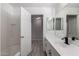 Clean bathroom with white vanity, black faucet, and bathtub at 3663 S Hassett --, Mesa, AZ 85212