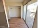 Bright bedroom with sliding glass door to balcony at 3840 N 43Rd Ave # 48, Phoenix, AZ 85031