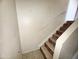 Interior stairs with stone-patterned tile at 3840 N 43Rd Ave # 48, Phoenix, AZ 85031