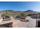 Backyard with fire pit, patio, and mountain views at 4202 S Cordia Ct, Gold Canyon, AZ 85118