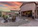 Extended backyard patio with seating area and hot tub at 4202 S Cordia Ct, Gold Canyon, AZ 85118