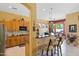 Spacious kitchen with granite countertops and wooden cabinetry at 4202 S Cordia Ct, Gold Canyon, AZ 85118