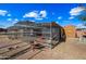 Metal animal enclosure with goats and a small shed at 424 E Lehi Rd, Mesa, AZ 85203