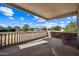 Covered back porch overlooks a large backyard at 424 E Lehi Rd, Mesa, AZ 85203