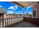 Brick porch overlooking a spacious backyard with a view of a pond at 424 E Lehi Rd, Mesa, AZ 85203