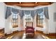 Bedroom with bay window and comfortable armchair at 424 E Lehi Rd, Mesa, AZ 85203