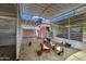 Indoor chicken coop with many chickens at 424 E Lehi Rd, Mesa, AZ 85203