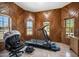 Home gym with treadmill and massage chair at 424 E Lehi Rd, Mesa, AZ 85203