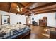 Main bedroom with hardwood floors and ensuite bathroom at 424 E Lehi Rd, Mesa, AZ 85203