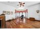 Bright sitting area with bay window, hardwood floors and comfy chair at 424 E Lehi Rd, Mesa, AZ 85203