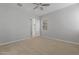 Bright bedroom with ceiling fan and an adjacent closet at 4267 E Bernice St, Gilbert, AZ 85295