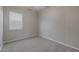 Simple bedroom with carpeted floor and window with blinds at 4267 E Bernice St, Gilbert, AZ 85295