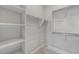 Bright walk-in closet with shelves and hanging rods at 4267 E Bernice St, Gilbert, AZ 85295