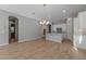 Open dining room adjacent to kitchen with hardwood floors at 4267 E Bernice St, Gilbert, AZ 85295