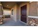 Exterior front door entry to a beautiful home with stone accents at 4267 E Bernice St, Gilbert, AZ 85295