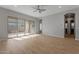 Bright living room with hardwood floors and sliding glass doors at 4267 E Bernice St, Gilbert, AZ 85295