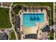 Aerial view of community pool with expansive sundeck and shade structures at 4362 E Clifton Ave, Gilbert, AZ 85295