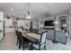 Dining room with large wooden table and access to backyard at 4362 E Clifton Ave, Gilbert, AZ 85295