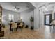 Bright entryway with wood-look tile floors, an office space, and a view into the home's interior at 4362 E Clifton Ave, Gilbert, AZ 85295