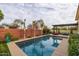 Enjoy this beautiful, refreshing pool and spa with a pergola at 4362 E Clifton Ave, Gilbert, AZ 85295