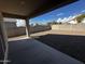 Large backyard with gravel and a covered patio at 44478 W Palo Abeto Dr, Maricopa, AZ 85138