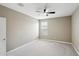 Bedroom with ceiling fan and carpet flooring at 44478 W Palo Abeto Dr, Maricopa, AZ 85138