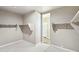 Large walk-in closet with double hanging rods at 44478 W Palo Abeto Dr, Maricopa, AZ 85138