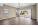 Bright dining room with tile floors and sliding glass doors to patio at 44478 W Palo Abeto Dr, Maricopa, AZ 85138