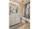 Clean bathroom with white vanity and floral shower curtain at 4711 E Silverwood Dr, Phoenix, AZ 85048