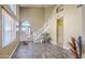 Bright entryway with tile flooring, staircase, and natural light at 4711 E Silverwood Dr, Phoenix, AZ 85048