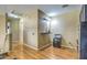 Home hallway with wood flooring and neutral walls at 4711 E Silverwood Dr, Phoenix, AZ 85048