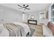 Bright bedroom with light flooring, ceiling fan and en-suite bathroom at 4901 E Sheridan St, Phoenix, AZ 85008