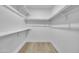 Large closet with double hanging rods and a shelf at 4901 E Sheridan St, Phoenix, AZ 85008