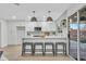 Modern kitchen with white cabinets and a large island at 4901 E Sheridan St, Phoenix, AZ 85008