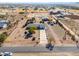 Aerial view of property with home and barn at 52615 W Esch Trl, Maricopa, AZ 85139