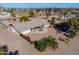 Aerial view of a ranch-style home with a large backyard at 52615 W Esch Trl, Maricopa, AZ 85139