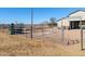 Metal barn with stalls, loading chute, and outdoor space at 52615 W Esch Trl, Maricopa, AZ 85139