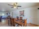 Dining area with view into living room at 52615 W Esch Trl, Maricopa, AZ 85139