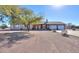 One-story home with a two-car garage and desert landscaping at 52615 W Esch Trl, Maricopa, AZ 85139