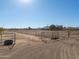 View of a large horse corral and riding arena at 52615 W Esch Trl, Maricopa, AZ 85139