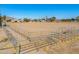 Large horse corral with metal fencing at 52615 W Esch Trl, Maricopa, AZ 85139