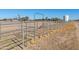 Metal fenced horse corral with gate at 52615 W Esch Trl, Maricopa, AZ 85139