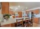 Kitchen with breakfast bar and stainless steel appliances at 52615 W Esch Trl, Maricopa, AZ 85139