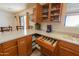 Corner cabinet with dishes and cutlery drawers at 52615 W Esch Trl, Maricopa, AZ 85139