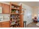 Well-organized pantry with ample shelving for food storage at 52615 W Esch Trl, Maricopa, AZ 85139