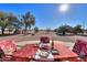 Outdoor dining patio with scenic views at 52615 W Esch Trl, Maricopa, AZ 85139