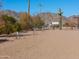 View of the property line with desert landscape and mountains at 52615 W Esch Trl, Maricopa, AZ 85139