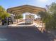 Covered RV parking with a spacious concrete pad at 52615 W Esch Trl, Maricopa, AZ 85139