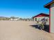 Large side yard with desert landscaping and a shed at 52615 W Esch Trl, Maricopa, AZ 85139